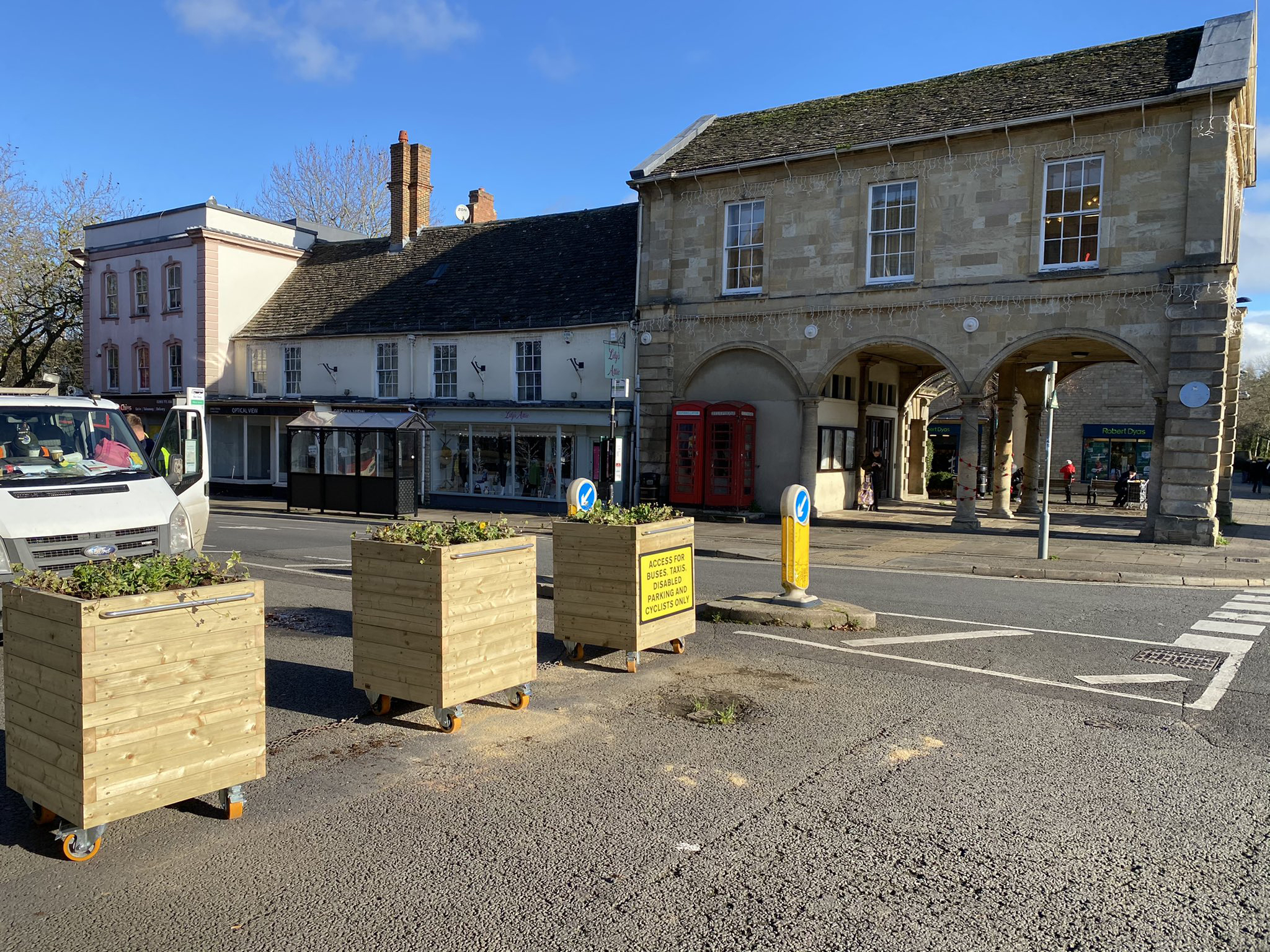 Large wooden planters on wheels in use by Witney Town Council Large wooden planters on wheels in use by Witney Town Council